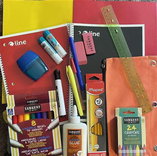Picture of the school supplies in kits that will be given to students